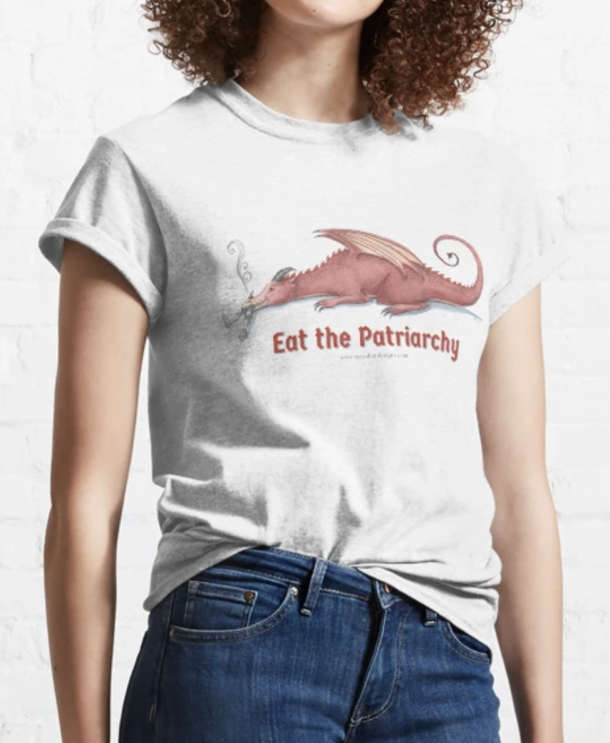 A woman in a white t-shirt with a red dragon eating a knight that reads Eat The Patriarchy. Click to see all Weyakin Designs art on Redbubble.