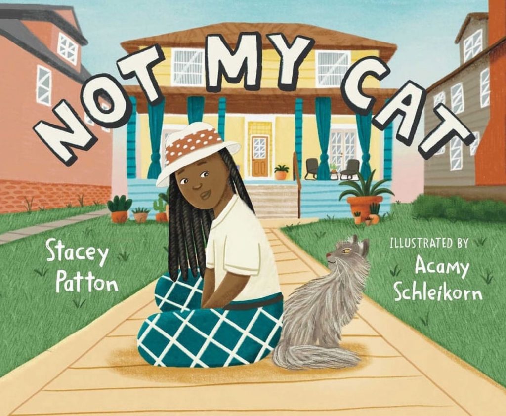 The book cover for NOT MY CAT by Stacy Patton and illustrated by Aacamy Schleikorn. A Black woman with locs sits on a sidewalk with a grey cat leading up to a yellow house.